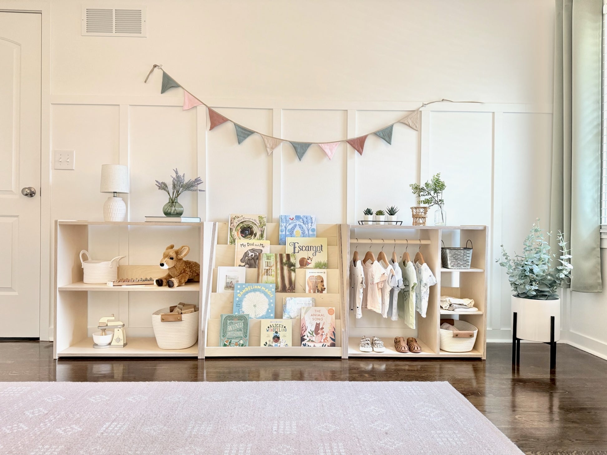 Children's room with shelves displaying toys, books, and clothing.